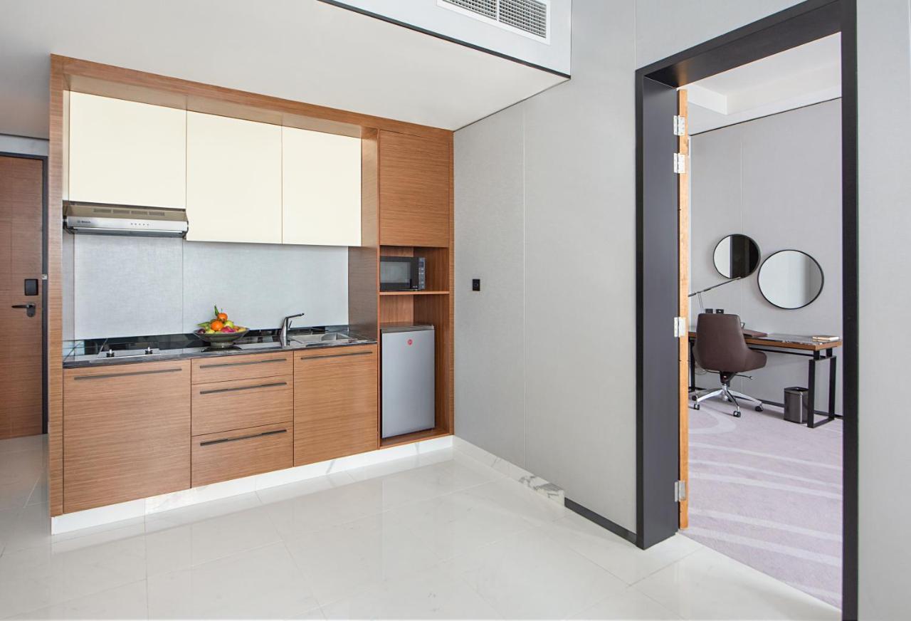 Asiana Grand Hotel ดูไบ ภายนอก รูปภาพ A kitchenette in a hotel