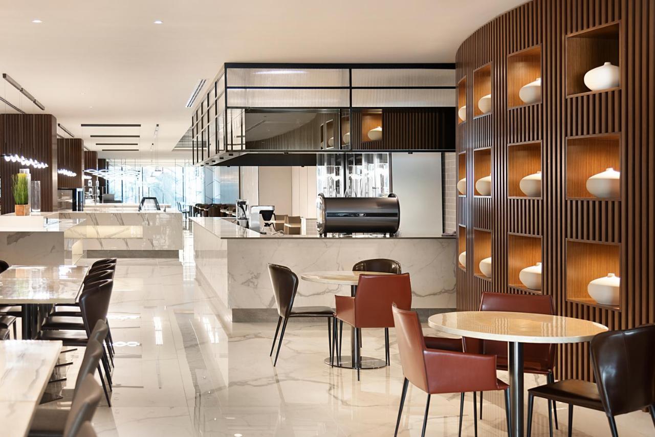 Asiana Grand Hotel ดูไบ ภายนอก รูปภาพ The lounge at the airport