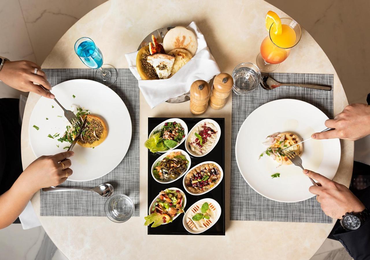 Asiana Grand Hotel ดูไบ ภายนอก รูปภาพ A selection of meze