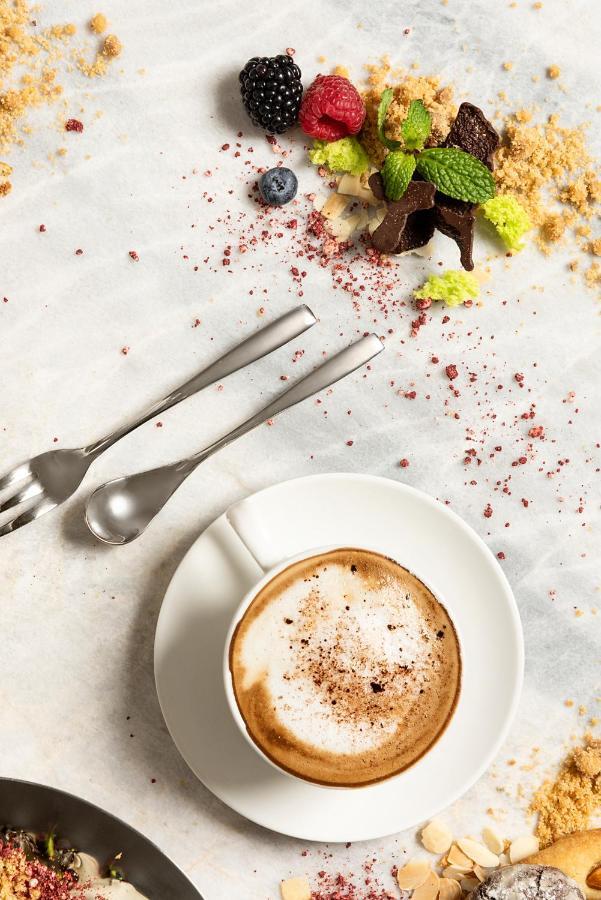 Asiana Grand Hotel ดูไบ ภายนอก รูปภาพ A cup of coffee