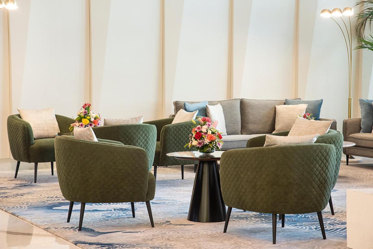 Asiana Grand Hotel ดูไบ ภายนอก รูปภาพ The lounge at the airport
